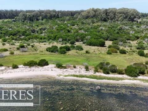 Lote en venta 1era linea Laguna garzon, El Caracol — foto 5