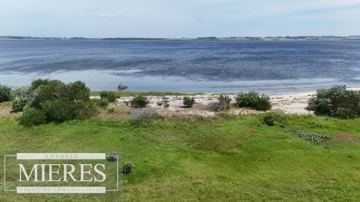 Lote en venta 1era linea Laguna garzon, El Caracol — foto 9