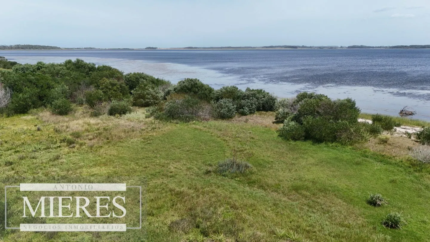 Lote en venta 1era linea Laguna garzon, El Caracol — foto 10