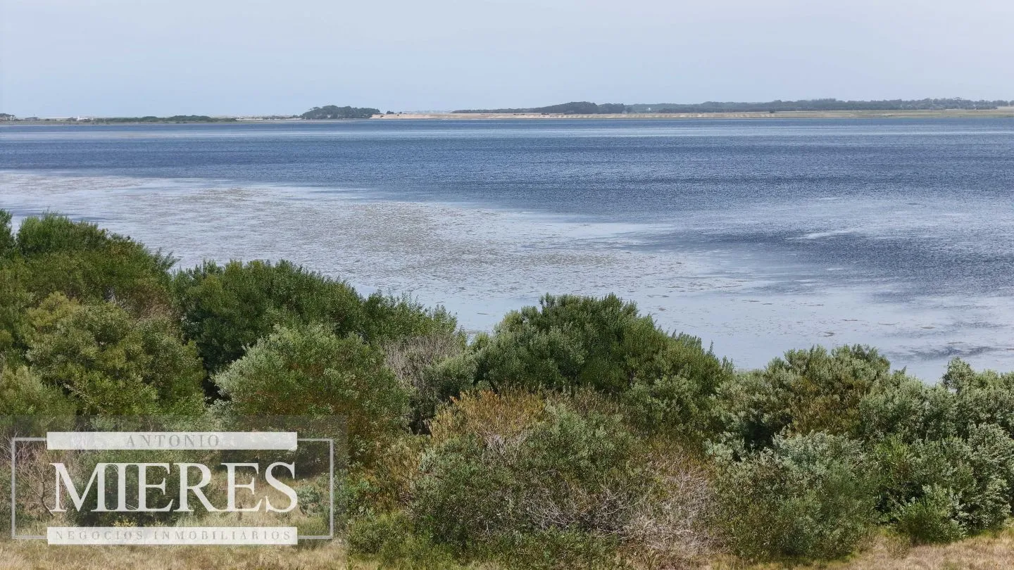 Lote en venta 1era linea Laguna garzon, El Caracol — foto 11
