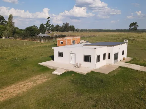 Chacra de 5 ha con dos casas en San Carlos